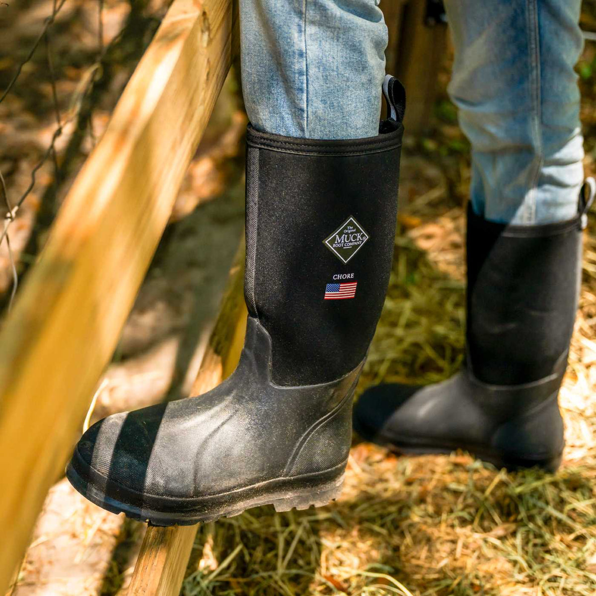 Person wearing CHHUS00 Chore Classic USA Men's Work Boot with in a farm setting.