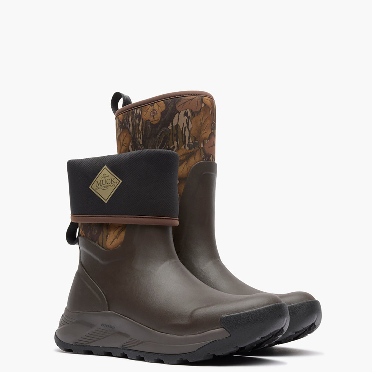 Pair of Muck green rubber boots with camouflage pattern on a white background