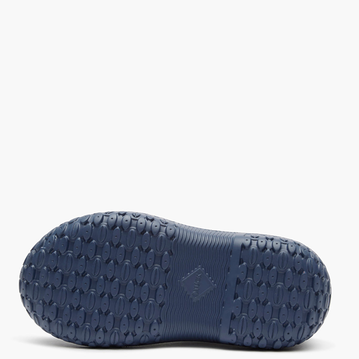 Navy blue shoe sole with textured pattern on a white background