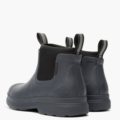 Pair of gray rubber boots with elastic sides on a white background